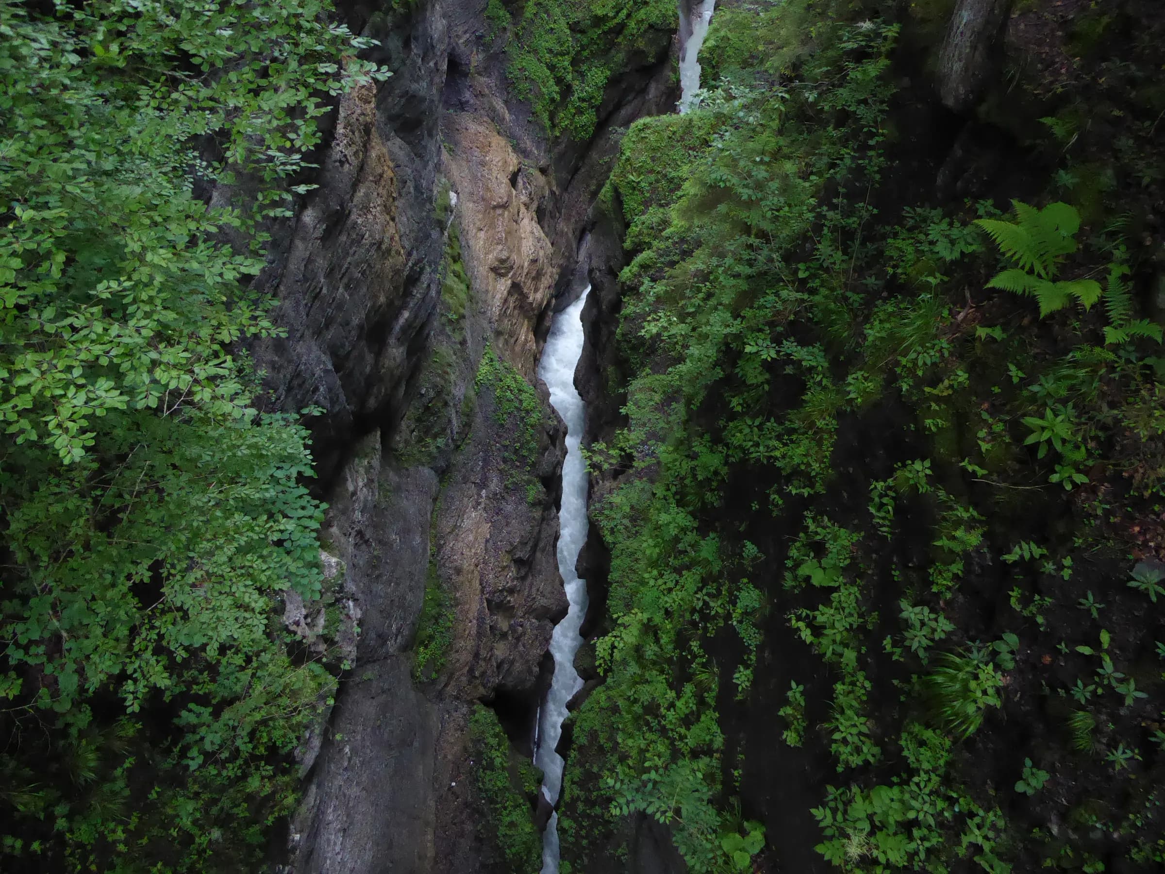 Dark, wet gorge section in alpine terrain at the Zugspitz Ultratrail