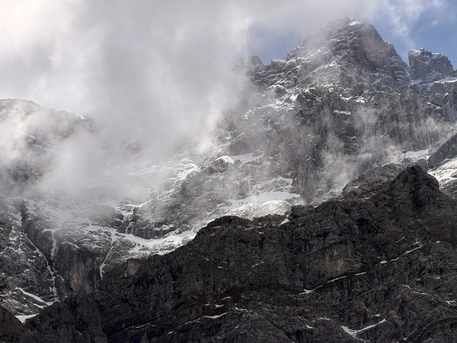 Clouds moving over the rocky Riffelwandspitzen, Zugspitz Ultratrail 107K course at KM 14.2.