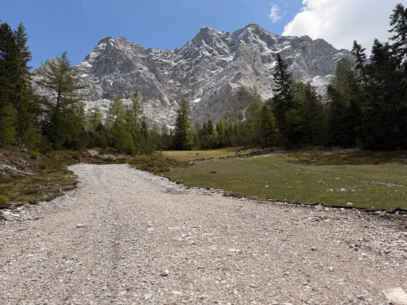 Wide gravel road at the foot of the Wetterstein mountains, Zugspitz Ultratrail 107K at KM 18.4.