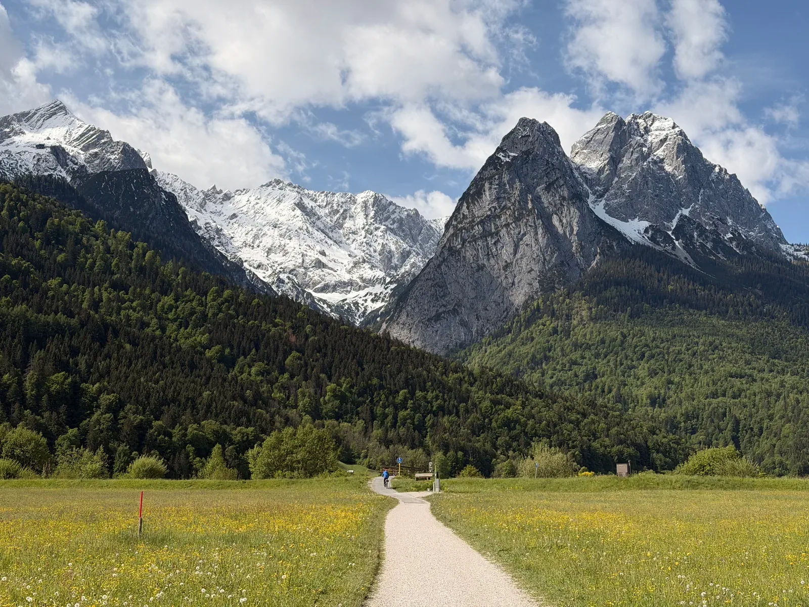 Flat opening on asphalt near Garmisch-Partenkirchen with Wetterstein views, Zugspitz Ultratrail 107K.